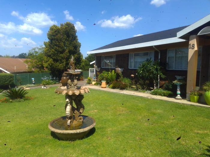 Rensburg House For Sale: Spacious yard, borehole, double garage, near primary school.