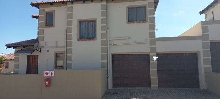 3 Bedroom Townhouse To Rent in Arundo Estate with garden, security, and garages.