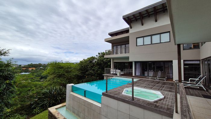 For Sale: 5-Bedroom House in Simbithi Eco Estate with pool, study, and garage.