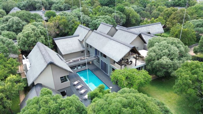 For Sale: K'shane House with pool, gym, cinema, and eco-friendly amenities.