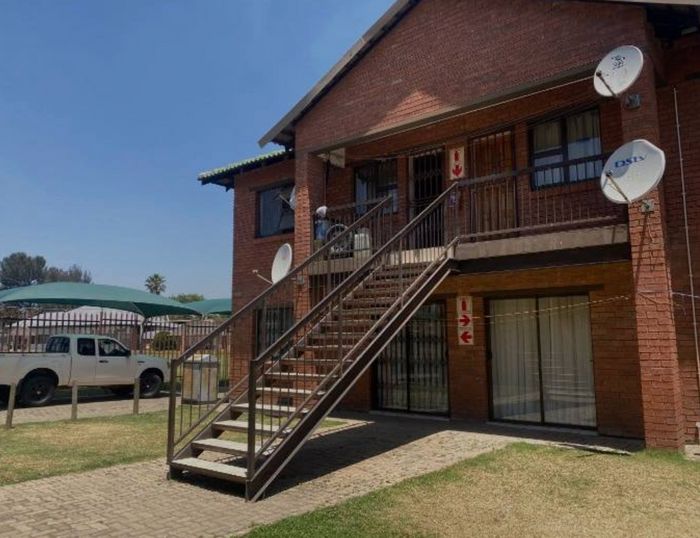 Apex Apartment For Sale: 2 Bedrooms, secure parking, close to amenities.