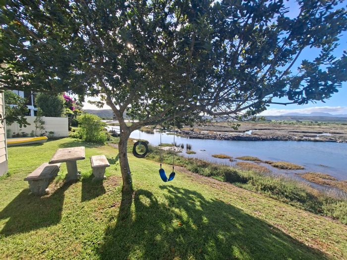 Riverside House For Sale: Riverfront living, pool, study, and approved garage plans.