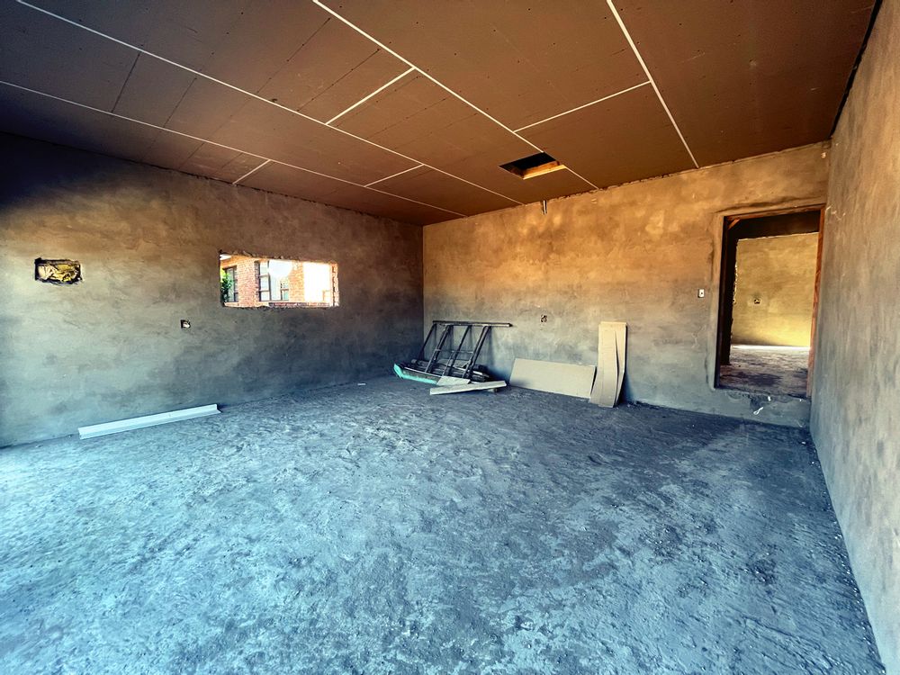 Double Garage Leading to Scullery