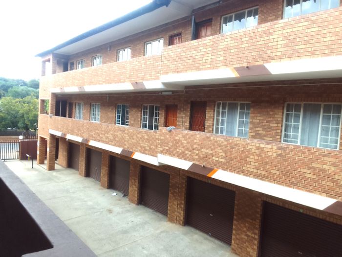 For Sale: Apartment in Rustenburg Central with secure access, scullery, and parking.