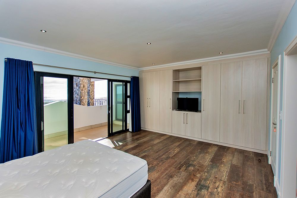 2nd upper bedroom with ample cupboards