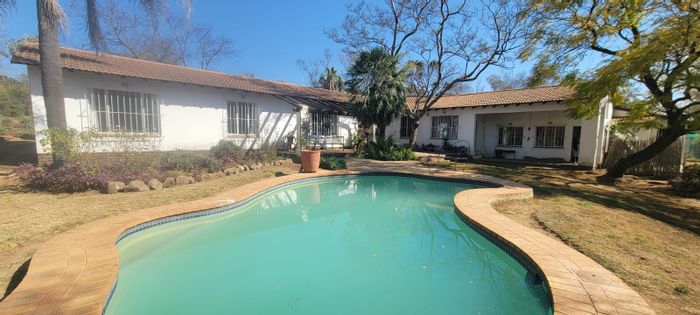 For Sale: House in Farmall AH with pool, studio, and expansive land.