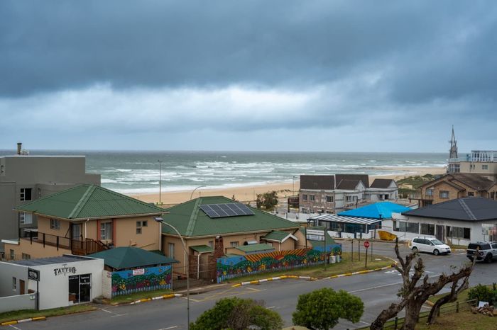 For Sale: Apartment in Jeffreys Bay Central with balcony, secure parking, and beach access.