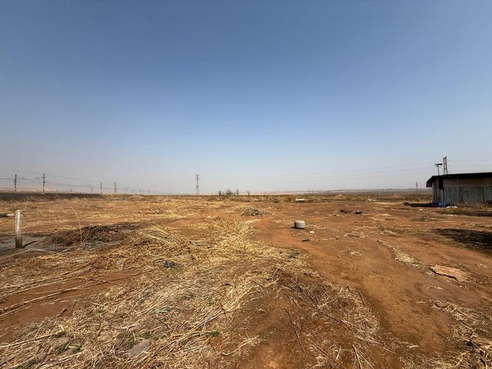 For Sale: 3.8-hectare Farm in Withok Estate with borehole and workshop potential.