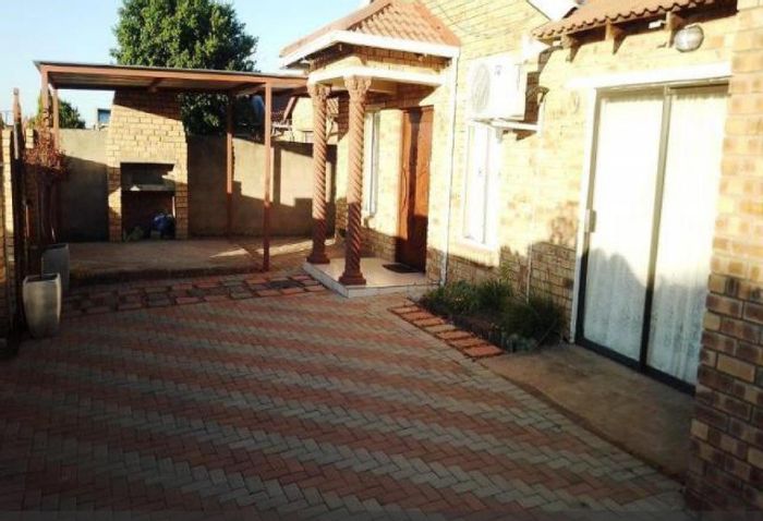 For Sale: 3-Bedroom House in Mandela View with flatlet, garage, and braai area.