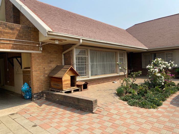 For Sale: 4-Bedroom House in Parkdene with outdoor area, double garage, and security.
