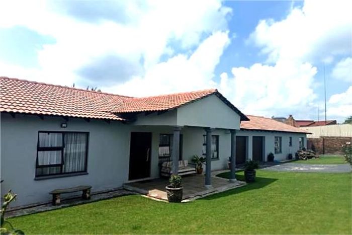 Fochville Central House For Sale: Spacious family living with multiple apartments and gardens.
