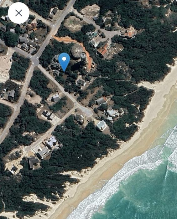 Prime 874m² vacant land for sale in Paradise Beach, steps from the beach.