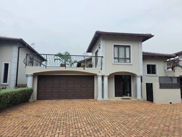 For Sale: Townhouse in Umhlali Golf Estate with golf views, study, and double garage.