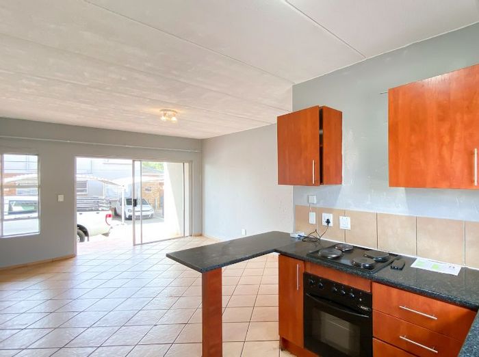2-Bedroom Apartment For Sale in Roodepoort, near schools and Westgate Mall.