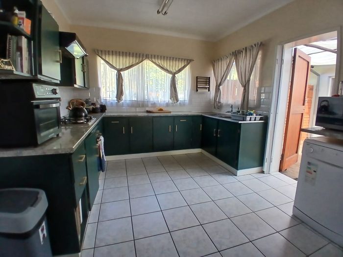 For Sale: Spacious 4-Bedroom House in Magalieskruin with Pool and Solar System.