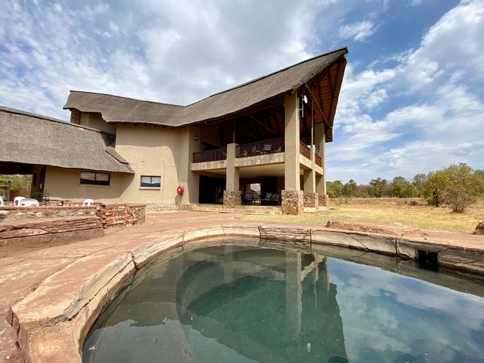 For Sale: House in Zebula Golf Estate, 4 bedrooms, golf course views, rental potential.
