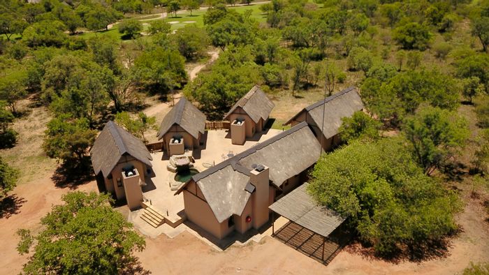 For Sale: House in Zebula Golf Estate with private cottages, golf course access.