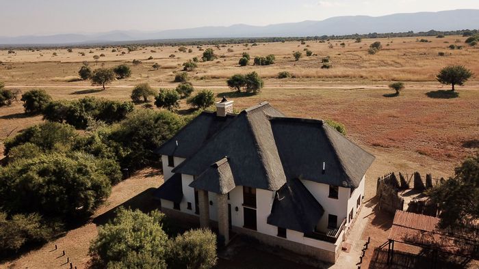 For Sale: House in Zebula Golf Estate with 4 beds, wildlife views, income potential.