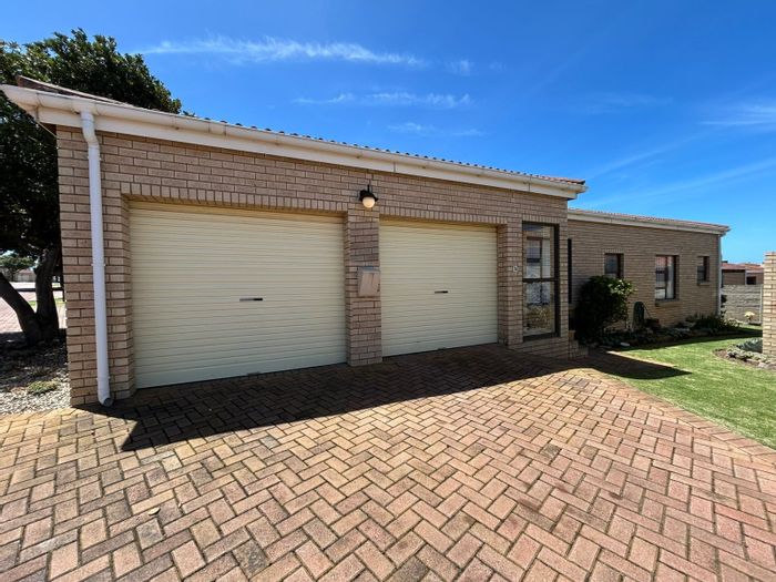 For Sale: Townhouse in Jeffreys Bay Central with garden, garage, and secure living.