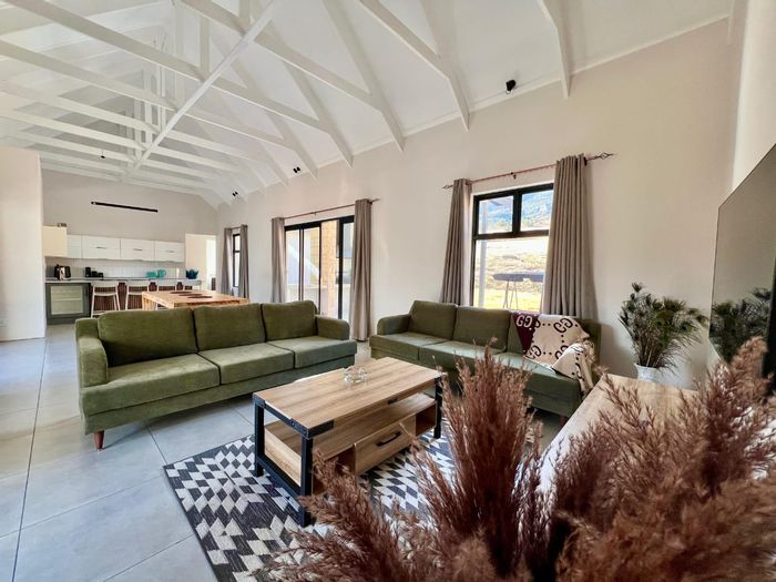 For Sale: House in Clarens Mountain Estate with 3 bedrooms, patio, and security.