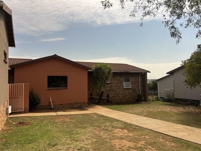 3-Bedroom House For Sale in Fochville Central with spacious yard and garage.