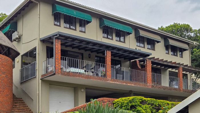 For Sale: Sunningdale Townhouse with pool, balcony, and spacious living areas.