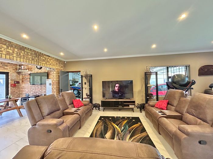 Wavecrest House For Sale: Open-plan living, three bedrooms, double garage, secure yard.