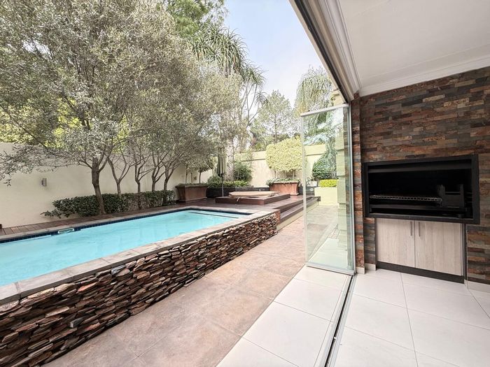 For Sale: Aviary Hill Townhouse with pool, jacuzzi, and top security features.