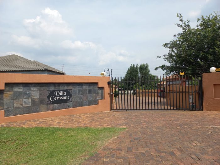 3-Bedroom Townhouse in Bergsig with backyard, double garage, and secure complex. To Rent.
