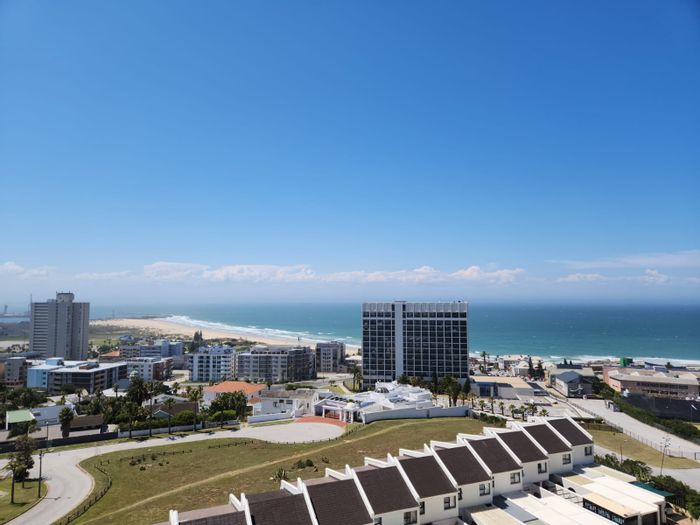 Humewood Townhouse For Sale: 2-bed, sea views, pool, braai facilities, secure complex.