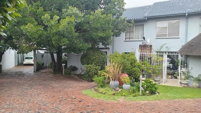 Primrose Townhouse For Sale: 2 Bedrooms, entertainment area, carport, and parking.