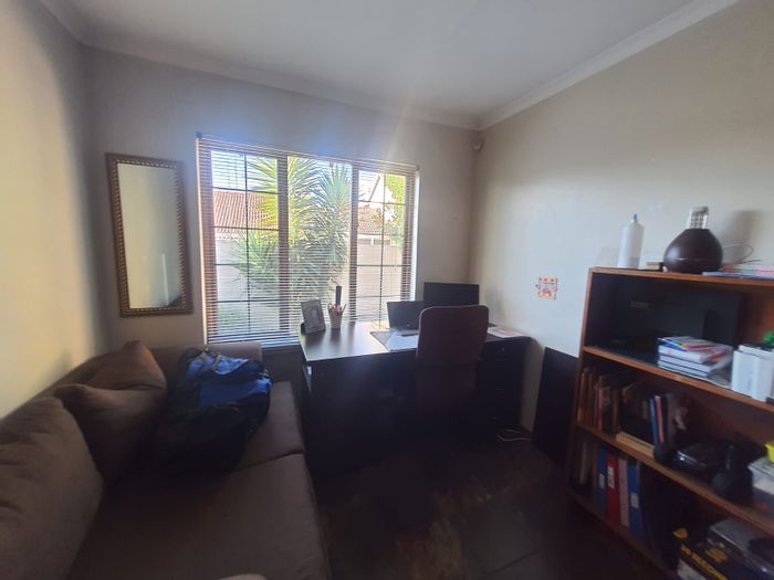 3-Bedroom Townhouse For Sale in Vaalpark with Garden and Garage.