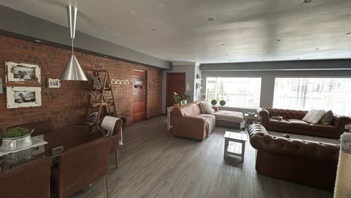 For Sale: House in Reyno Ridge with 4 beds, heated pool, gym, and entertainment area.