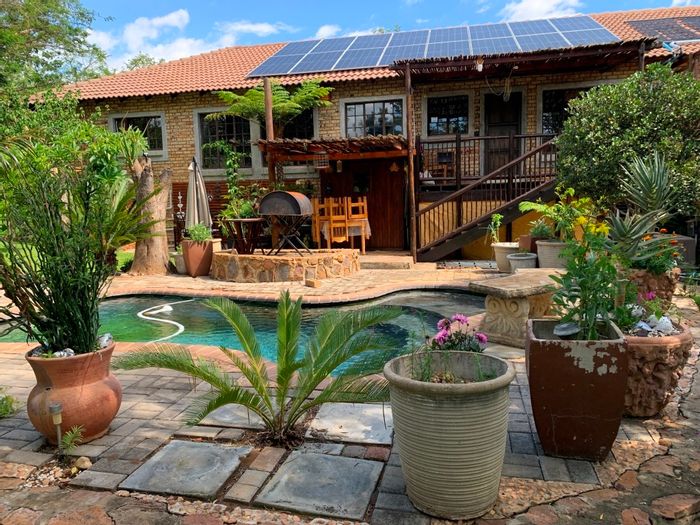 For Sale: House in Kranspoort with pool, garden, and eco-friendly features.