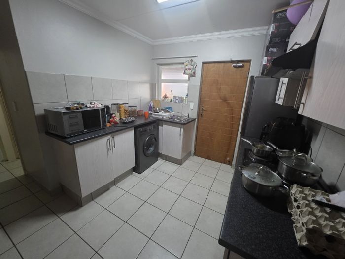 For Sale: 2-Bedroom Apartment in Montana with private patio and covered parking.