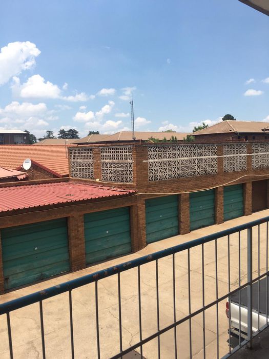 For Sale: Flat in Vanderbijlpark CW 3 with 2 beds, garage, and balcony.