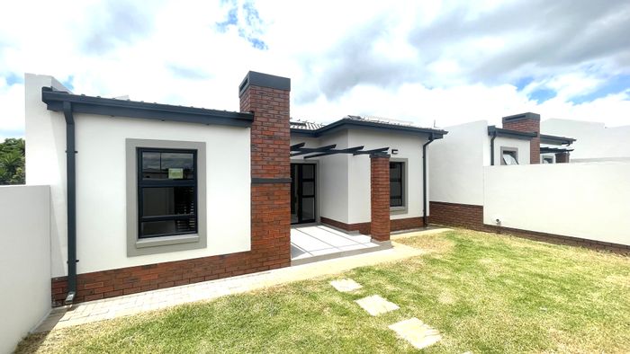 For Sale: House in Rietvalleirand with garden, security estate, and double garage.