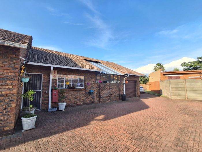 For Sale: 2-Bedroom Flat in Arcon Park with garage and play area.