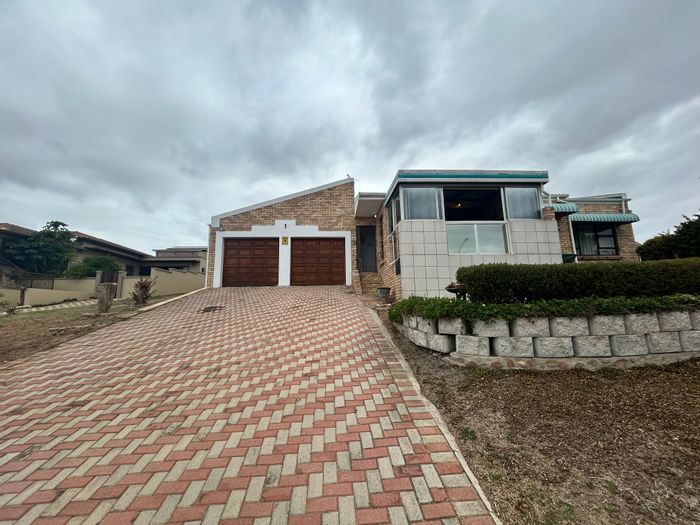 Wavecrest Townhouse For Sale: Sea views, enclosed balcony, double garage, flexible space.