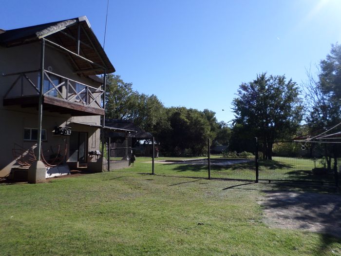 Ventersdorp Central Small Holding For Sale: 4 beds, pool, large land, income potential.