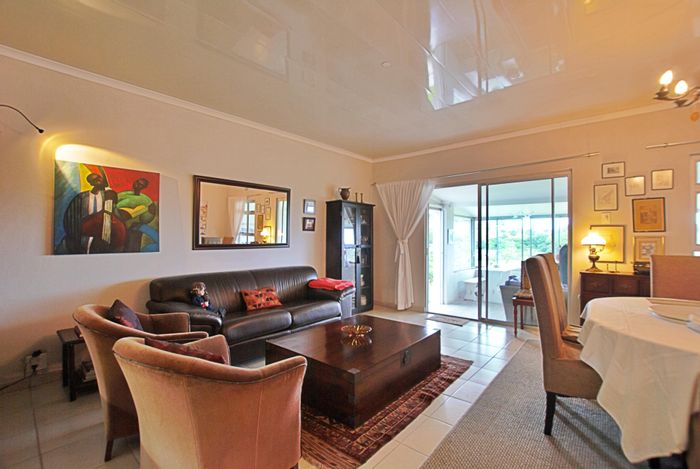 House for Sale in Mtwalume Central: 3 beds, sunroom, gated community, secure parking.