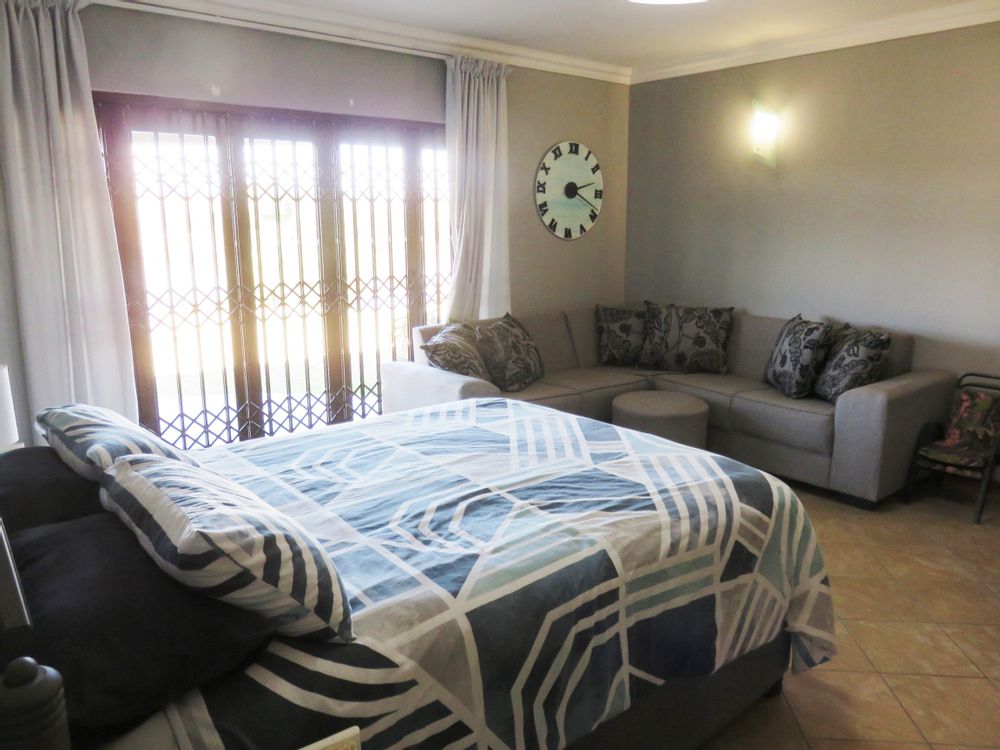 Flat 2 lounge opens to patio & river