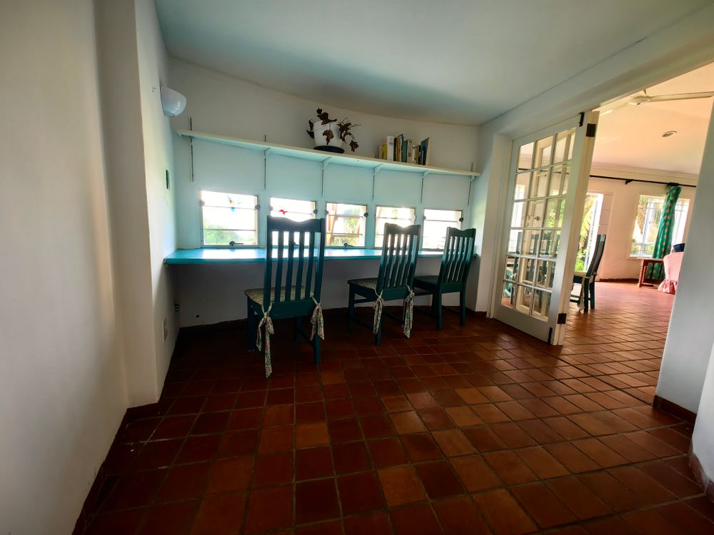 Study off the living area, view onto pool