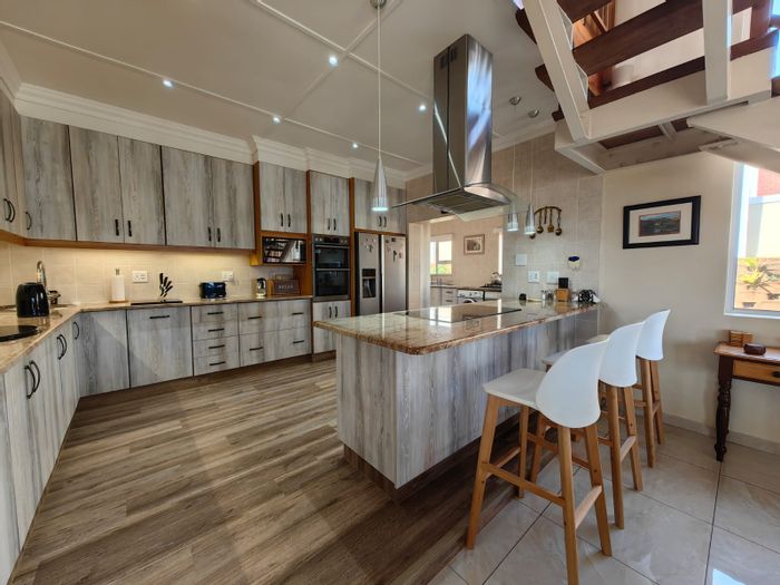 For Sale: House in Kelso with pool, bar, lift, and solar panels.