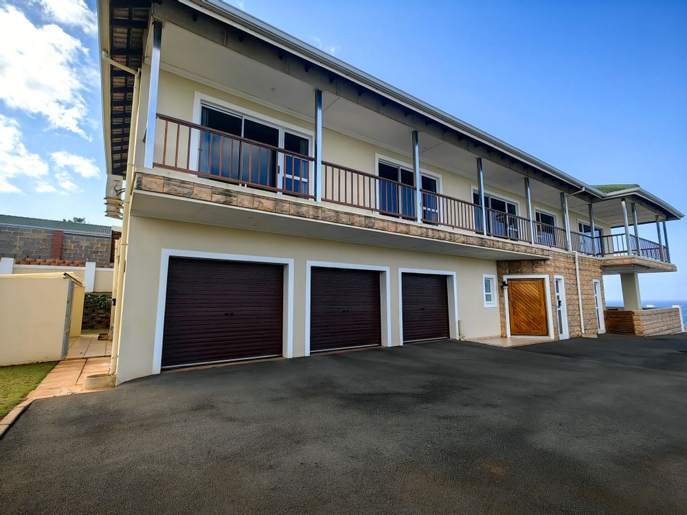 Triple garage with plenty of extra parking