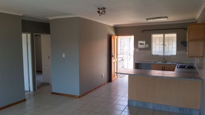 For Sale: Flat in Pretoria North, 2 beds, prepaid electricity, secure parking.