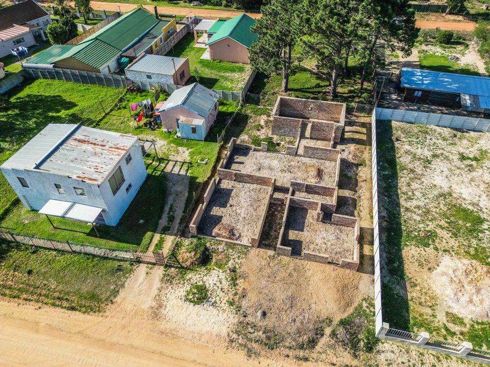 Partially built house with plans available