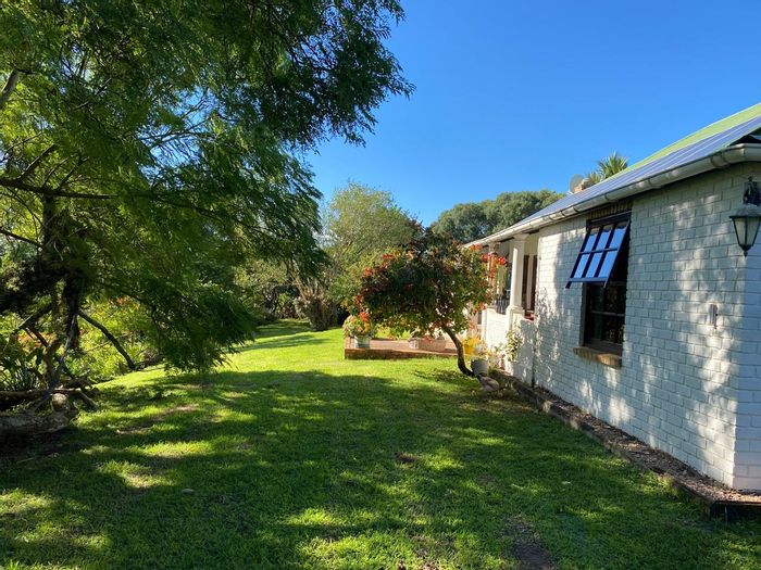 House for Sale in Bathurst Central: 3 beds, 3 baths, extensive gardens, self-sustaining features.