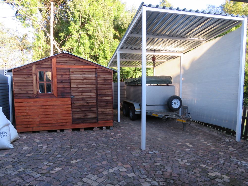 separate trailer carport and storage wendy house