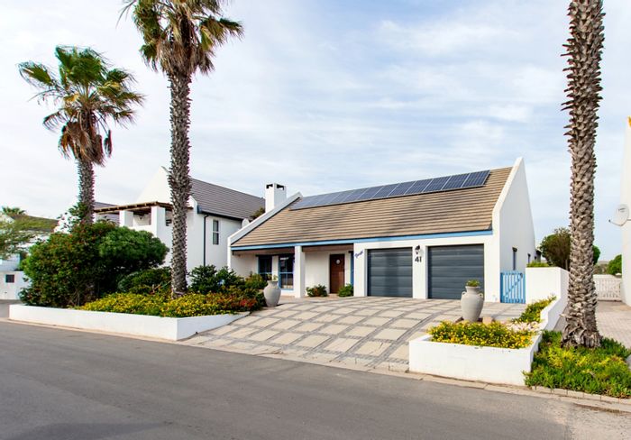 For Sale: 2-bedroom house in Golden Mile with pool, garage, and eco-friendly features.